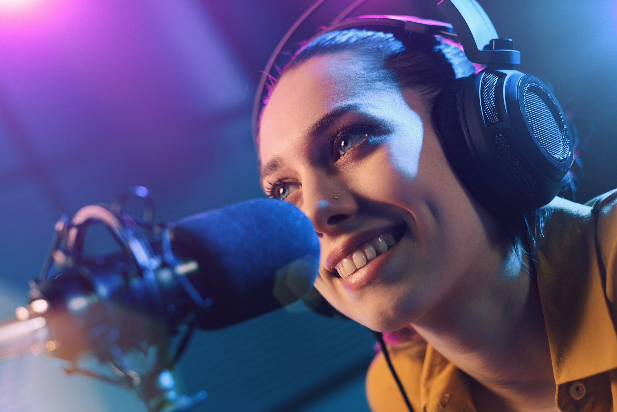 Portrait of a young radio dj at work